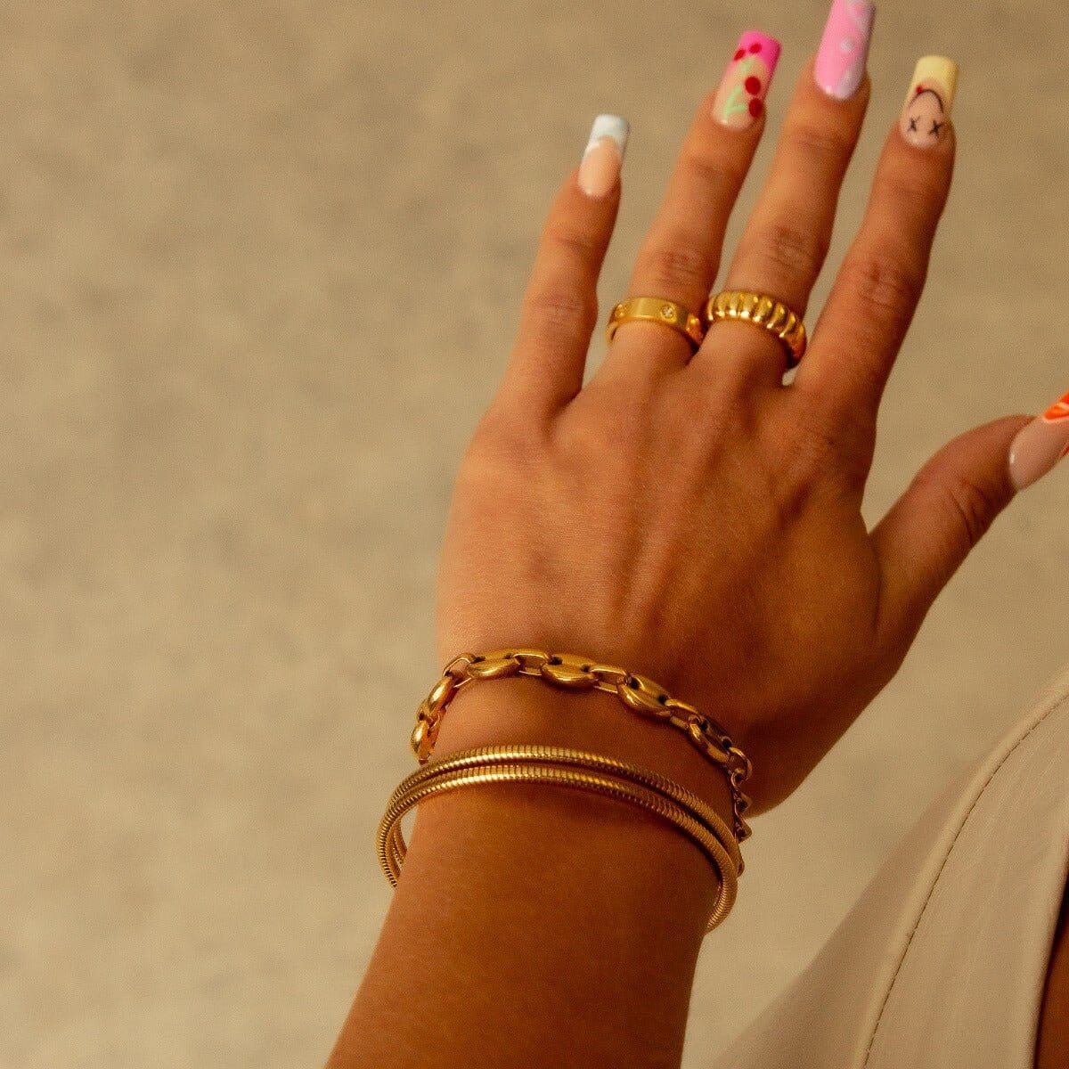 Bracelete Espiral Tríplice Banhada em Ouro 18K Pulseira Espiral Tríplice Banhada em Ouro 18K Minha loja 